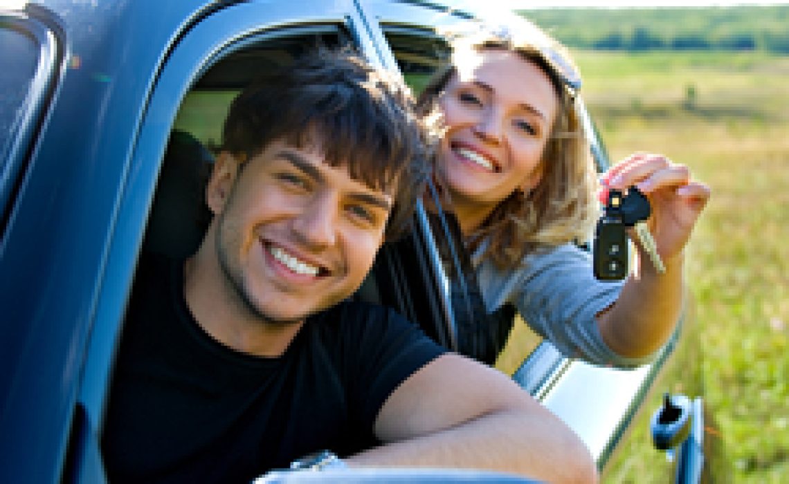 happy-bautiful-couple-showingh-keys-sitting-new-car (1)