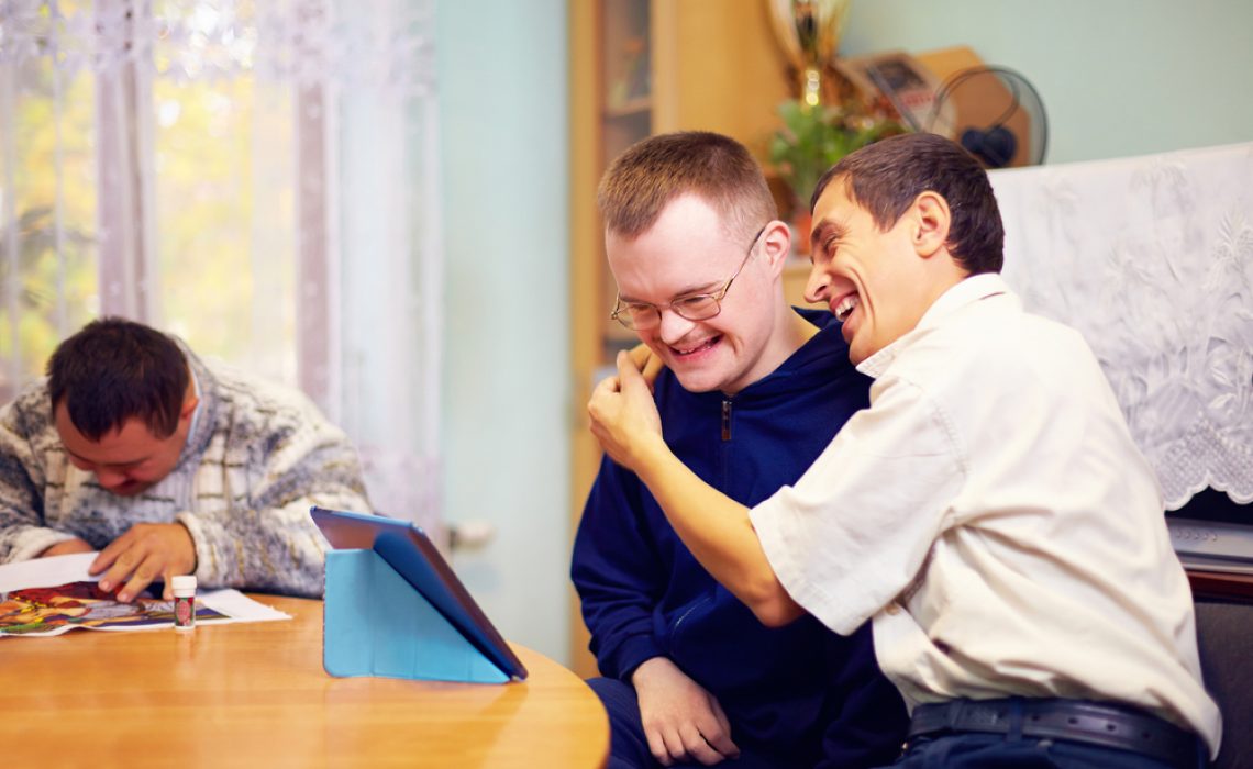 Happy,Friends,With,Disability,Socializing,Through,Internet
